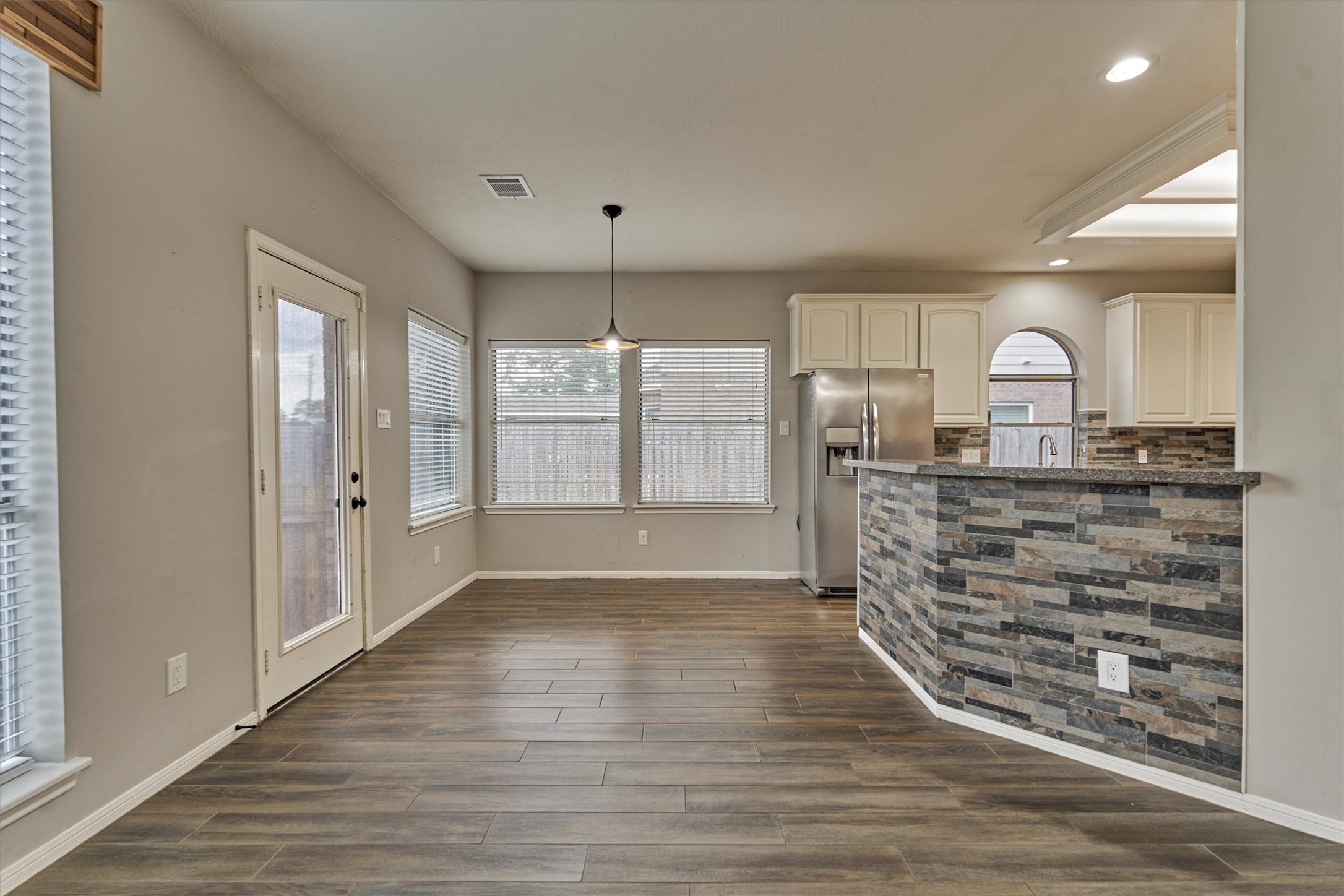 1618 Calmar Drive Spring, TX 77386 - Photo 11 of 30 a view of a livingroom with a large window