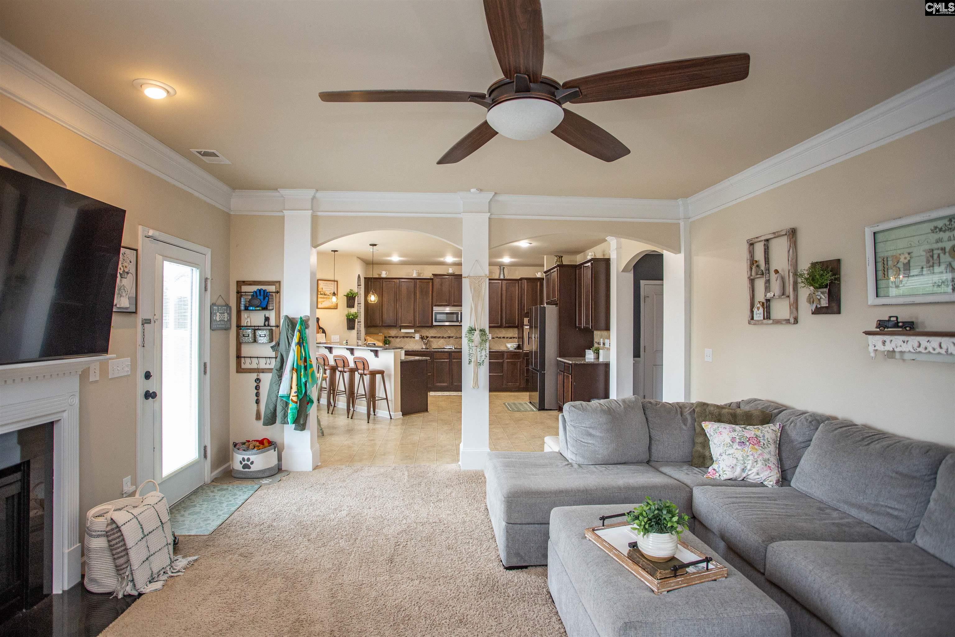 7 Templand Court Elgin, SC 29045 - Photo 19 of 47 a living room with furniture and a flat screen tv