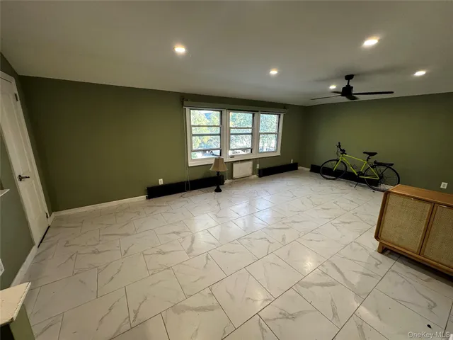 a view of a room with windows