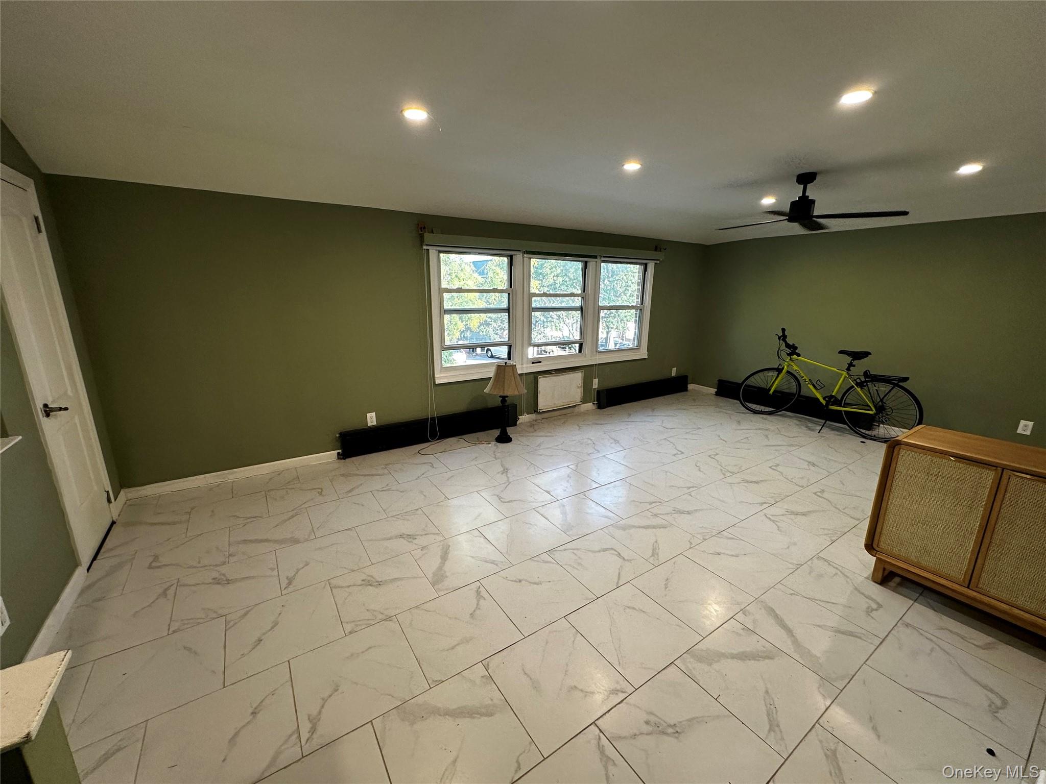 a view of a room with windows