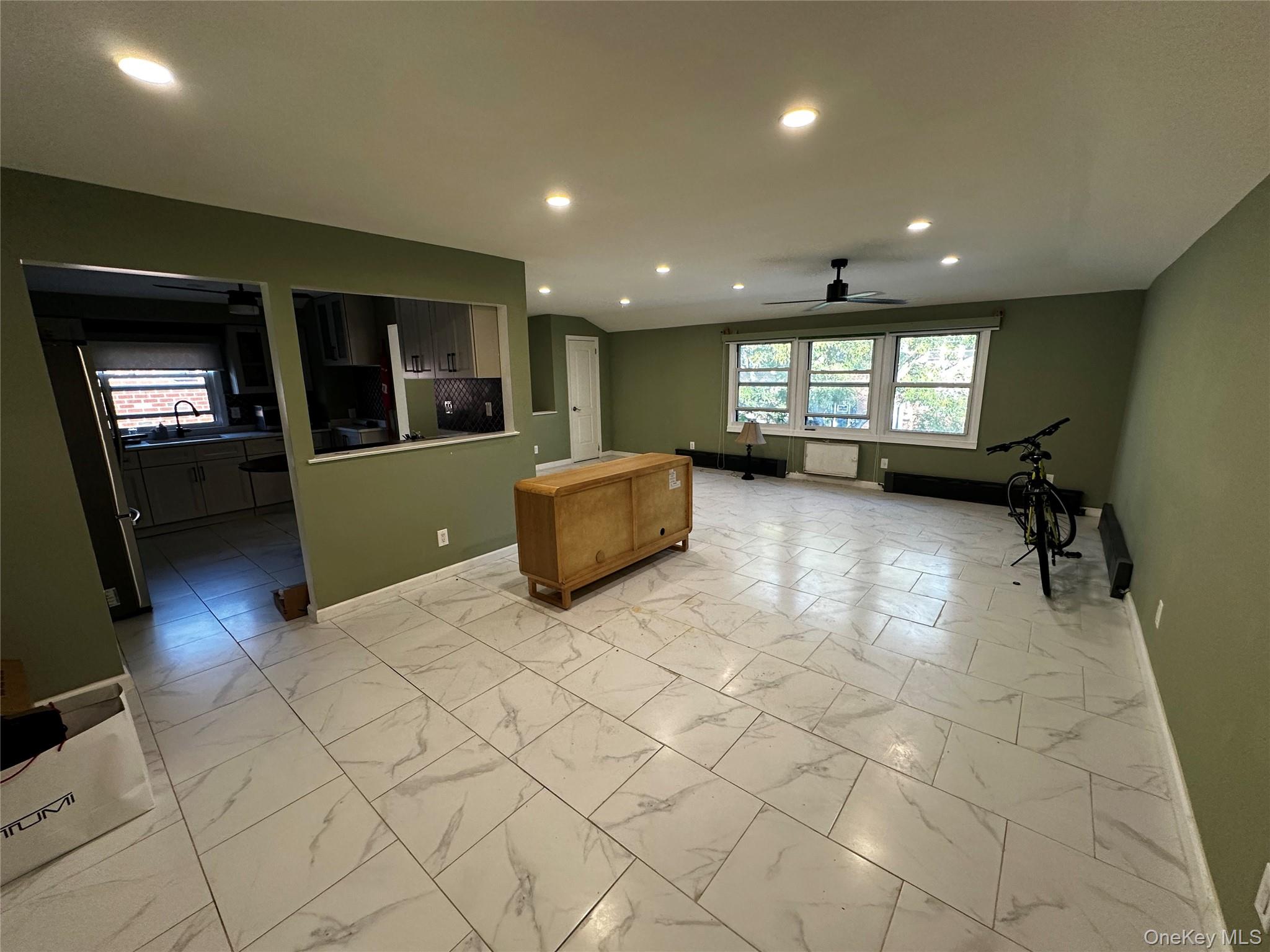89-32 Pontiac Street Queens, NY 11427 - Photo 3 of 9 a view of a livingroom with furniture and window