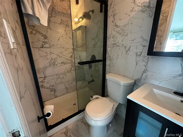 a bathroom with a sink and toilet