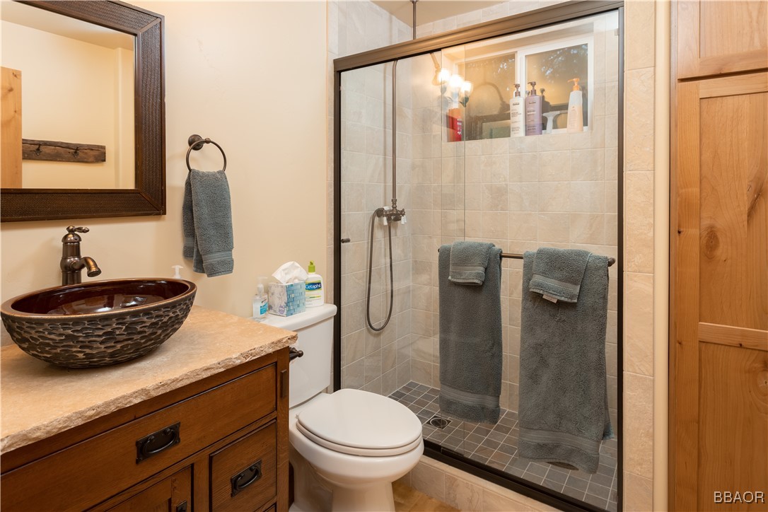 783 Thrush Drive Big Bear Lake, CA 92315 - Photo 12 of 24 a bathroom with a toilet and a sink