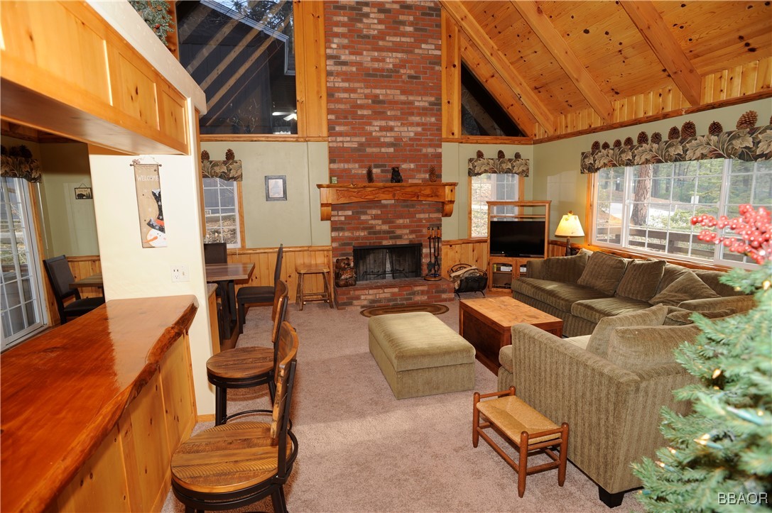 783 Thrush Drive Big Bear Lake, CA 92315 - Photo 3 of 24 a outdoor living space with patio furniture and a fireplace