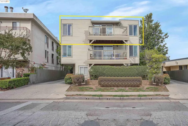 a view of a street with cars