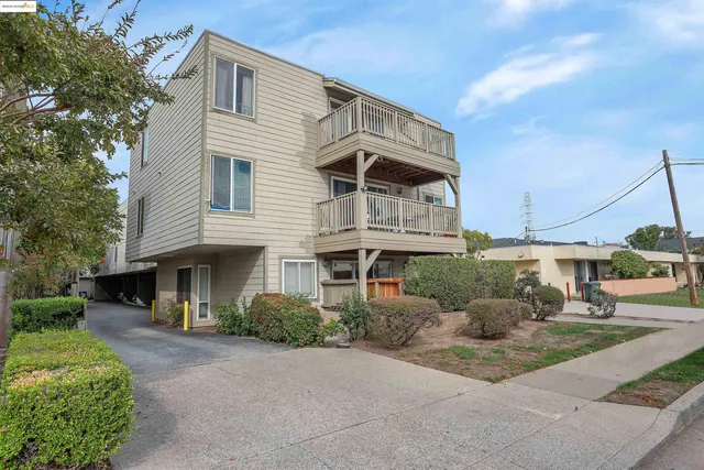 a view of a street with cars