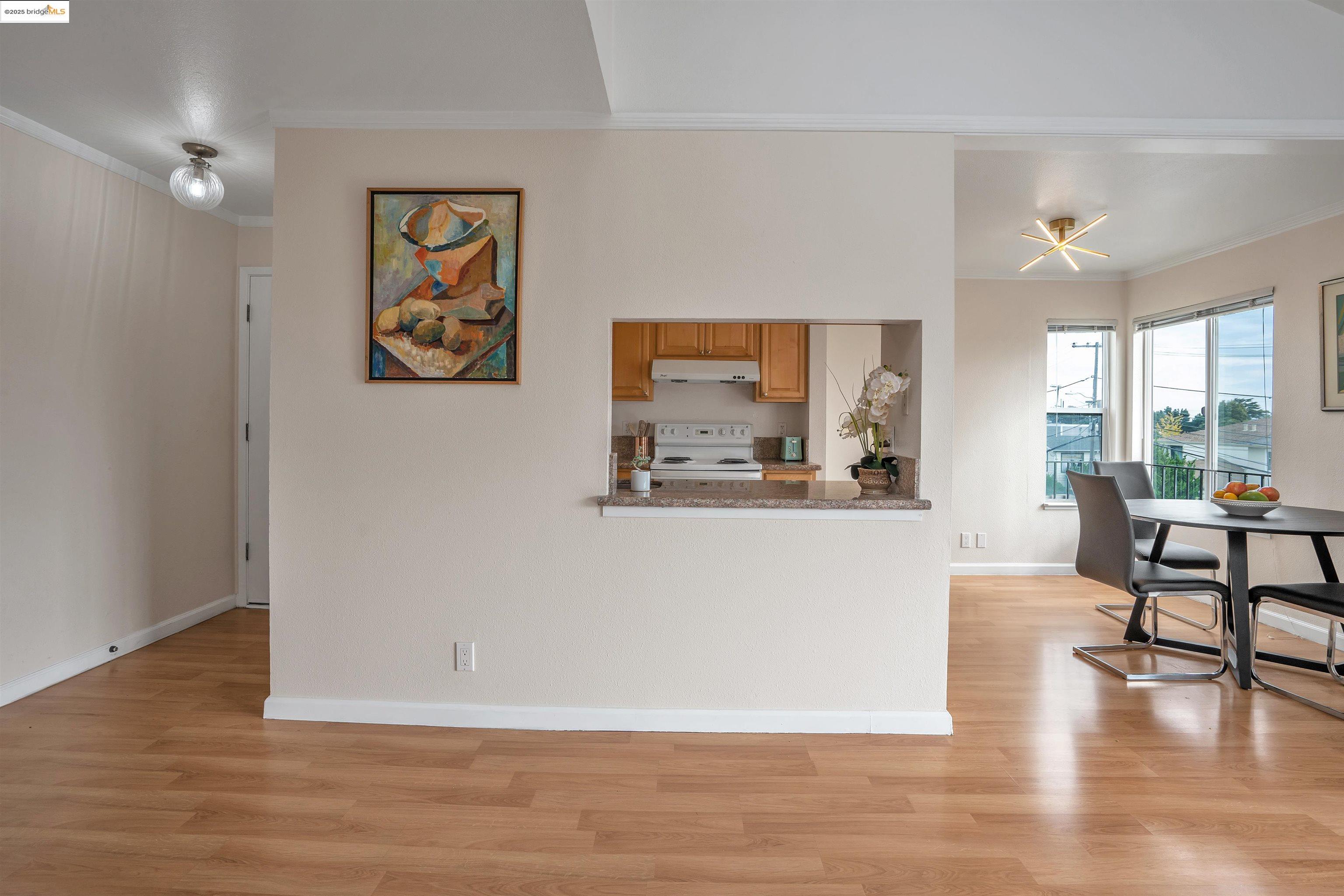 15 Mateo Avenue, Unit 7 Millbrae, CA 94030 - Photo 8 of 25 a view of a living room and wooden floor