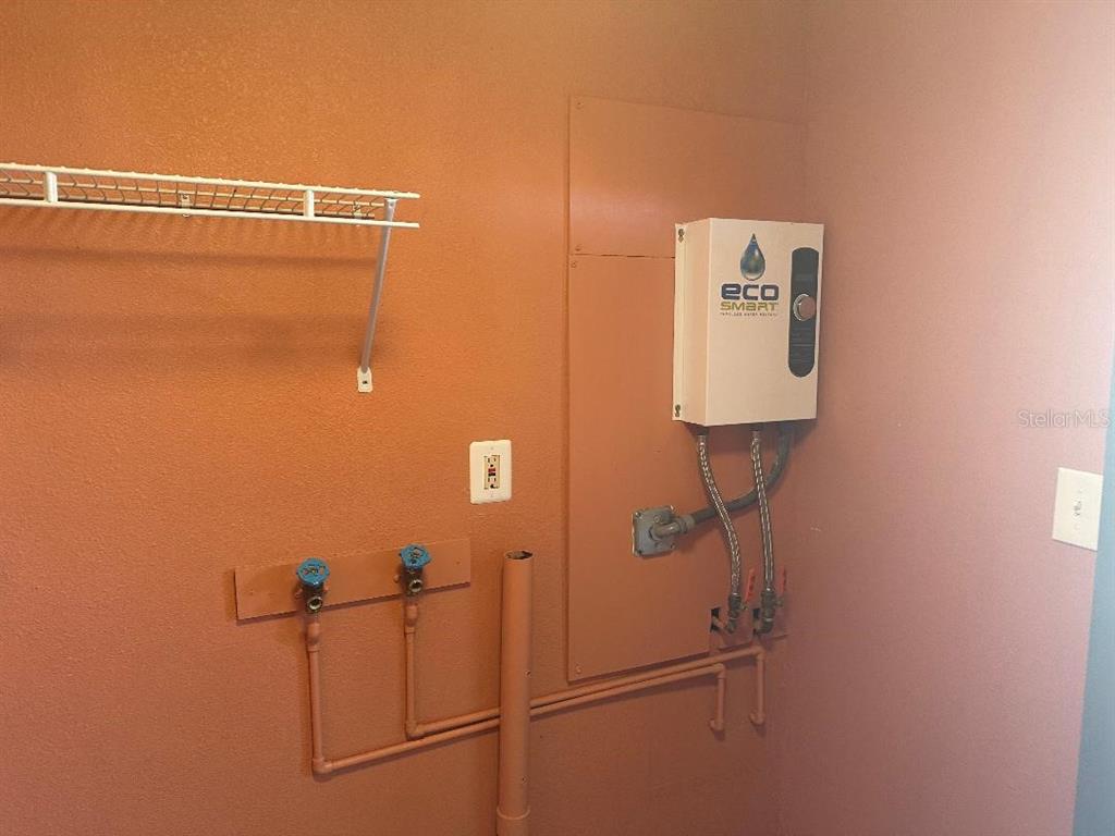 4048 Pecos Drive New Port Richey, FL 34653 - Photo 11 of 15 a bathroom with a shower