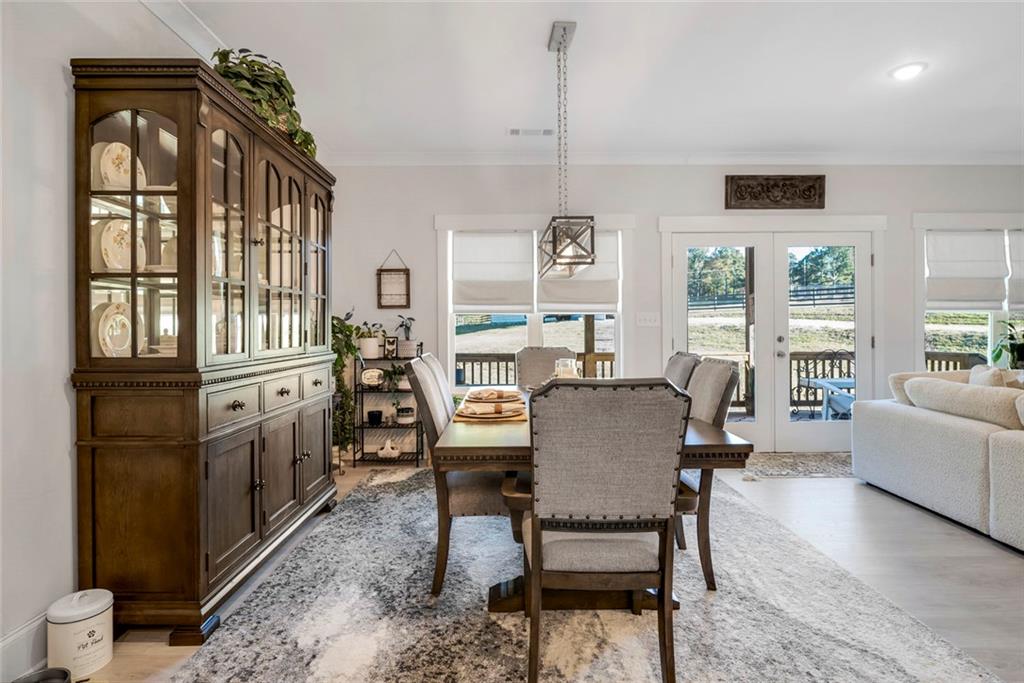 564 Old Airport Road Commerce, GA 30530 - Photo 10 of 39 a dining room with furniture and window
