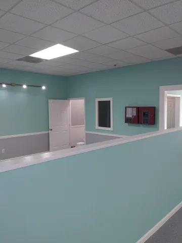 a play room with furniture and a table