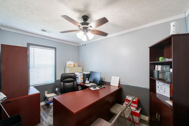 a kitchen with a sink stove and refrigerator