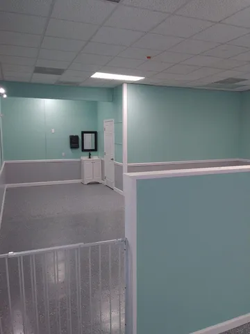 a bathroom with a toilet and a sink