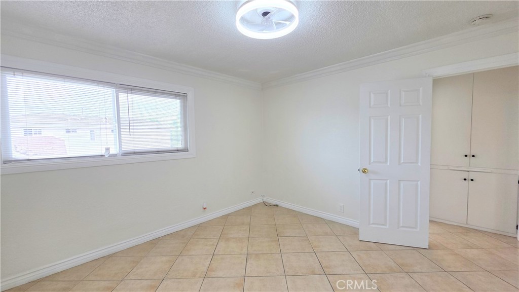 3733 Durfee Avenue, Unit 7 El Monte, CA 91732 - Photo 8 of 14 an empty room with windows
