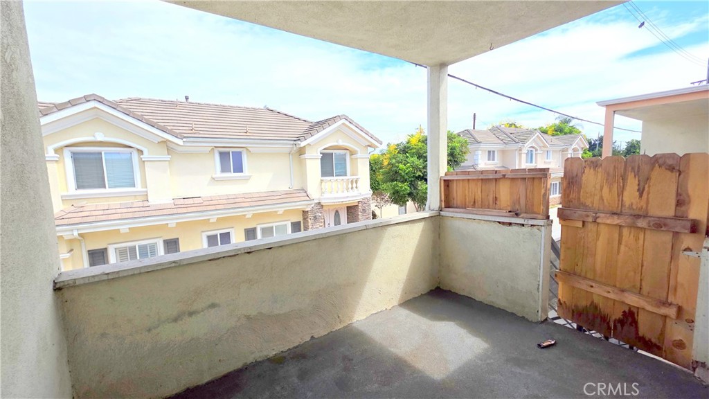 3733 Durfee Avenue, Unit 7 El Monte, CA 91732 - Photo 10 of 14 a view of a house with a balcony