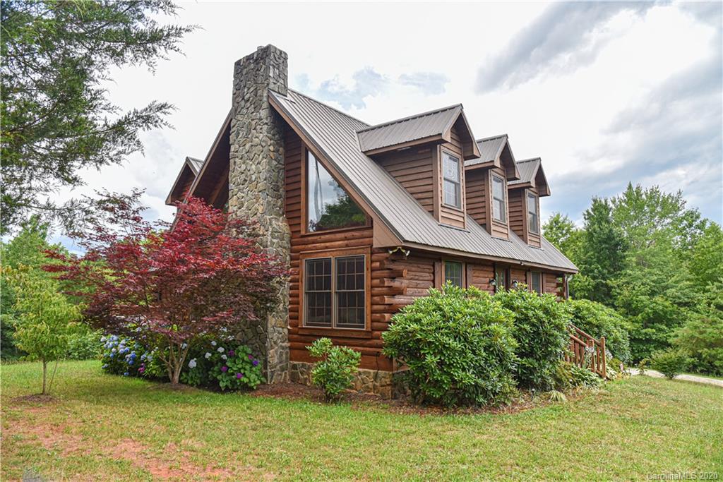 359 Dark Corner Road Rutherfordton, NC 28139 - Photo 1 of 36 a view of a house with a yard
