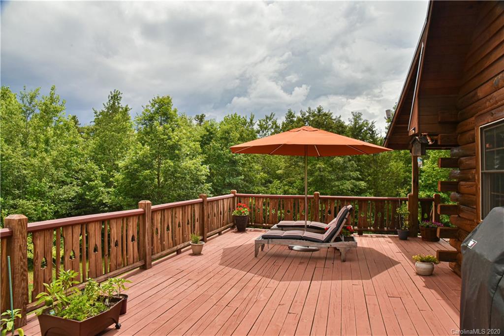 359 Dark Corner Road Rutherfordton, NC 28139 - Photo 13 of 36 a deck view with a seating space