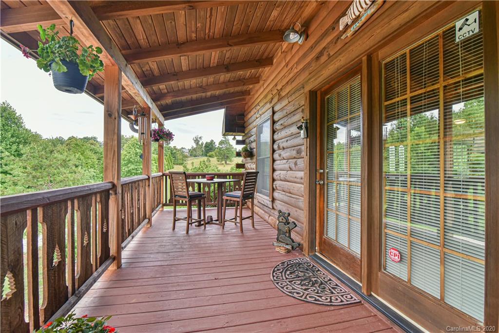 359 Dark Corner Road Rutherfordton, NC 28139 - Photo 16 of 36 a view of two chairs and table in the balcony