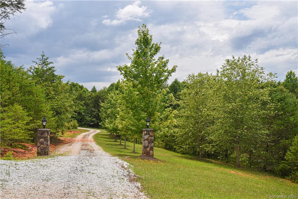 359 Dark Corner Road Rutherfordton, NC 28139 - Photo 9 of 36 a view of a yard with an outdoor space