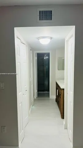 an entryway with a hallway