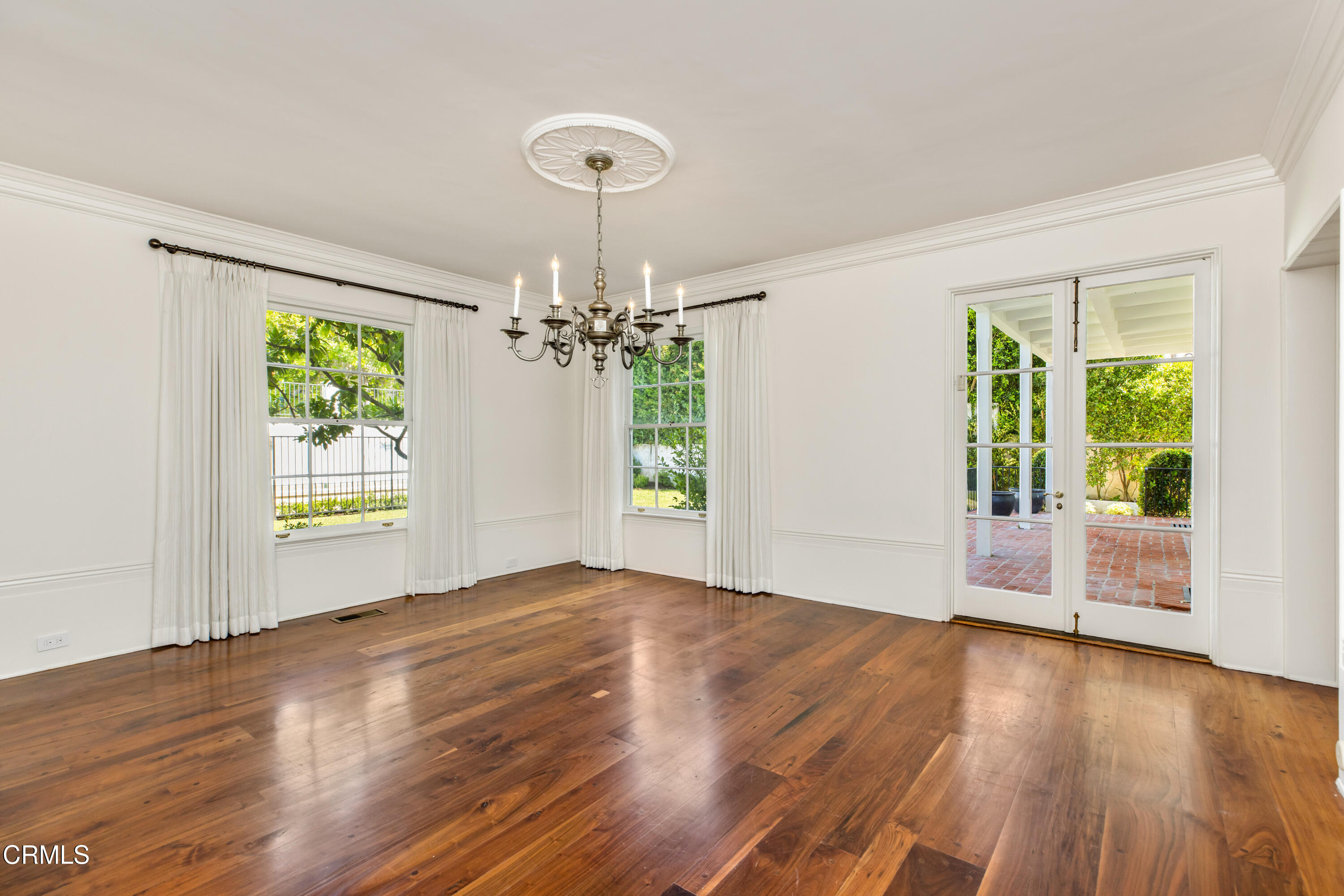 1184 Arden Road Pasadena, CA 91106 - Photo 14 of 62 a view of an empty room with wooden floor and a window