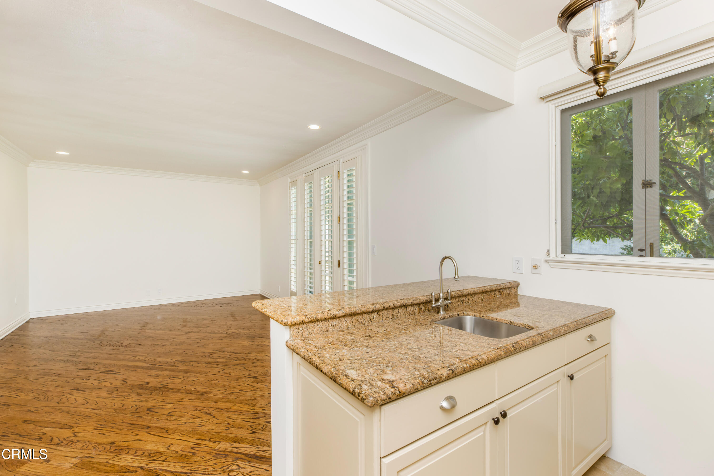 1184 Arden Road Pasadena, CA 91106 - Photo 15 of 62 a kitchen with sink cabinets and wooden floor