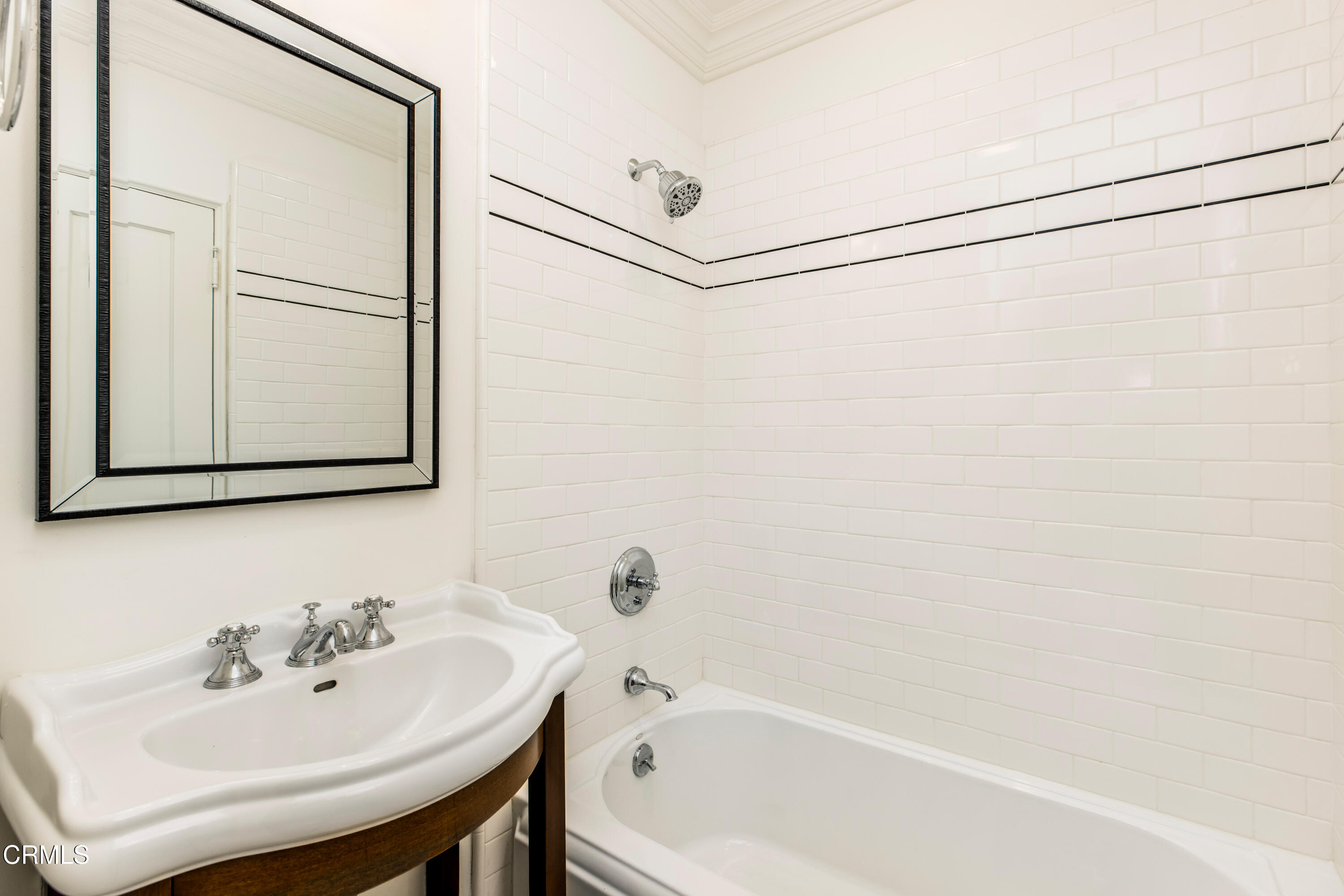 1184 Arden Road Pasadena, CA 91106 - Photo 21 of 62 a bathroom with a white bath tub