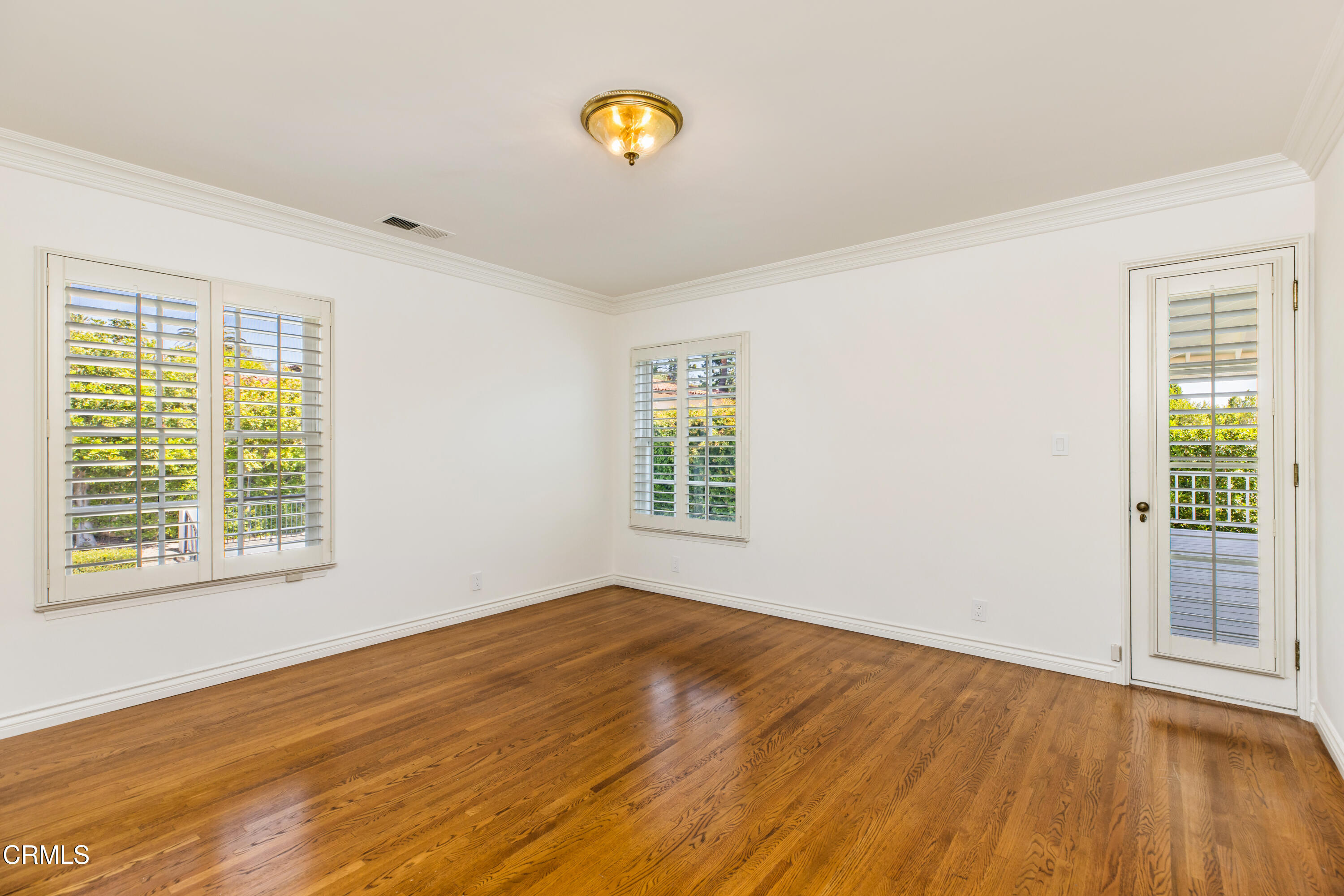 1184 Arden Road Pasadena, CA 91106 - Photo 40 of 62 a view of empty room with wooden floor and fan