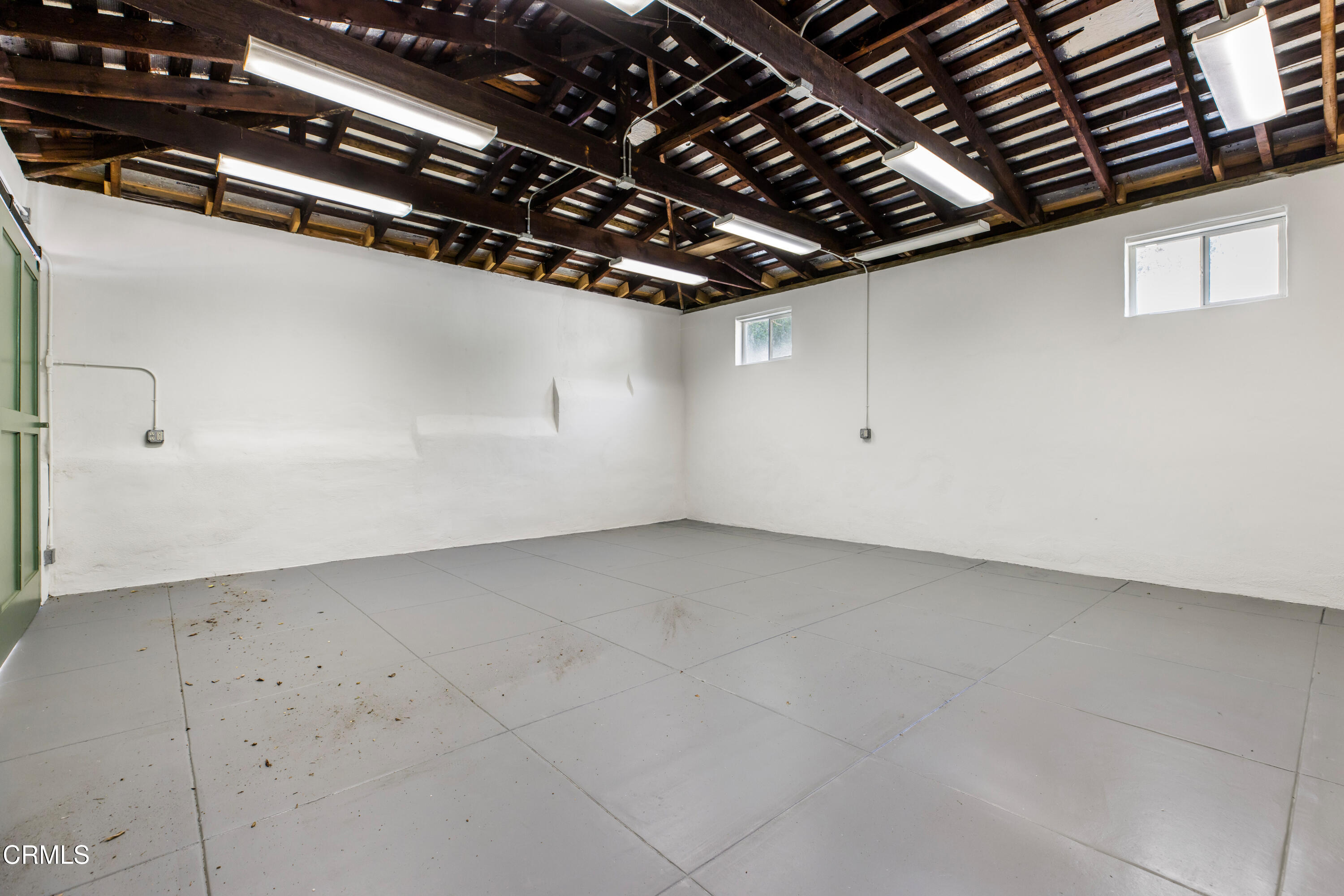 1184 Arden Road Pasadena, CA 91106 - Photo 45 of 62 a view of a room with racks on the wall