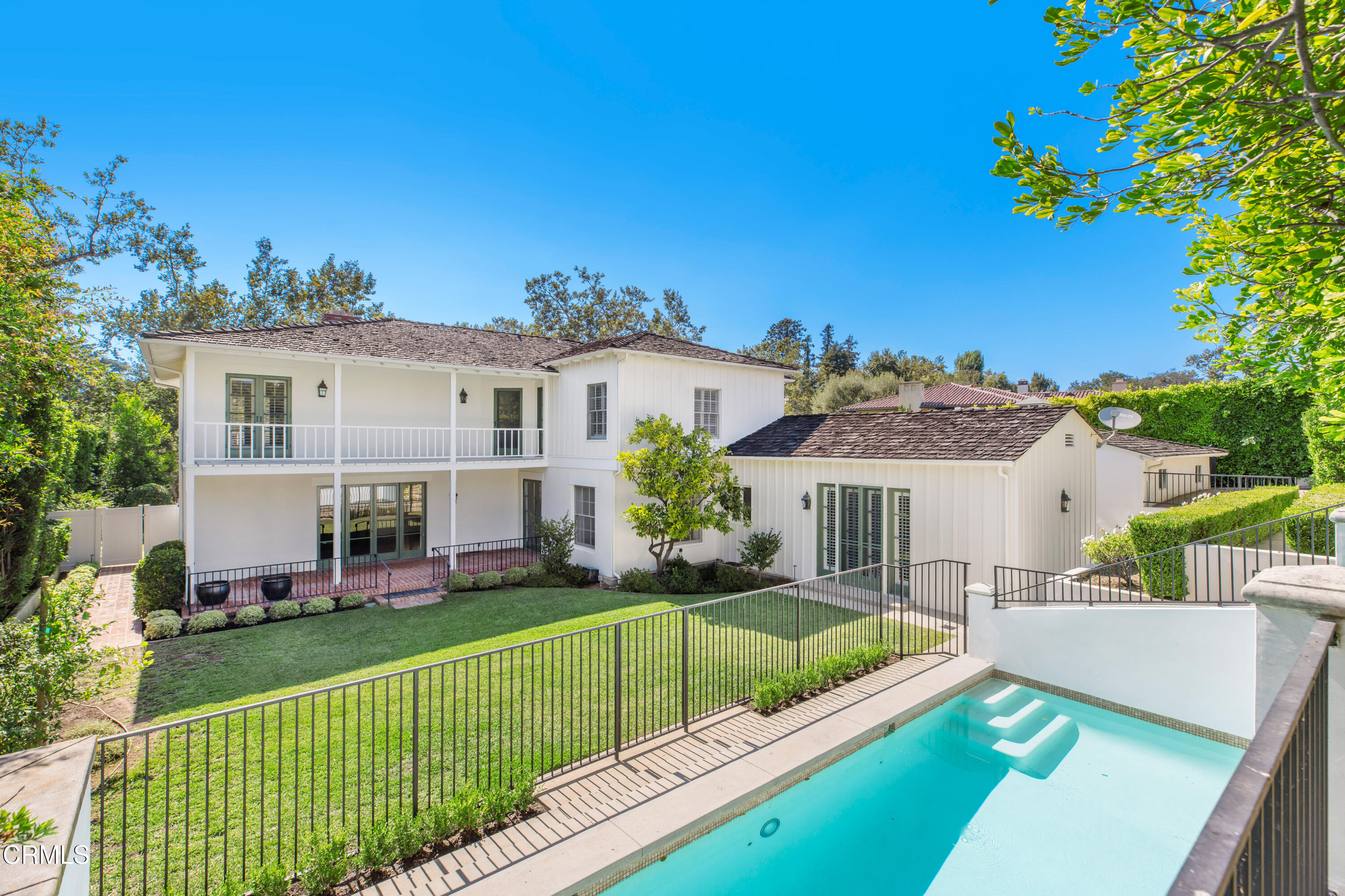 1184 Arden Road Pasadena, CA 91106 - Photo 49 of 62 a view of a house with a big yard and potted plants