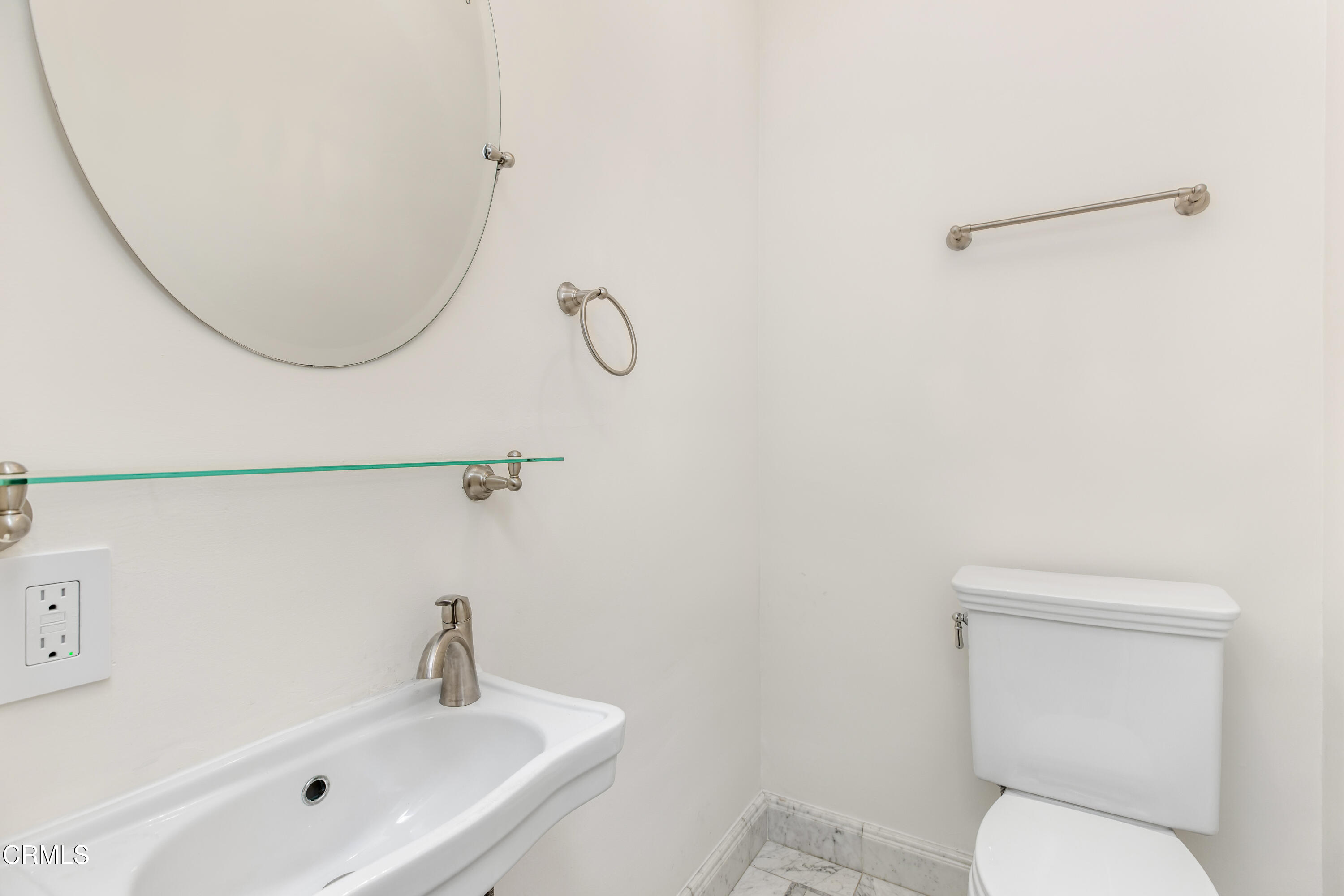 1184 Arden Road Pasadena, CA 91106 - Photo 54 of 62 a bathroom with a toilet sink and mirror