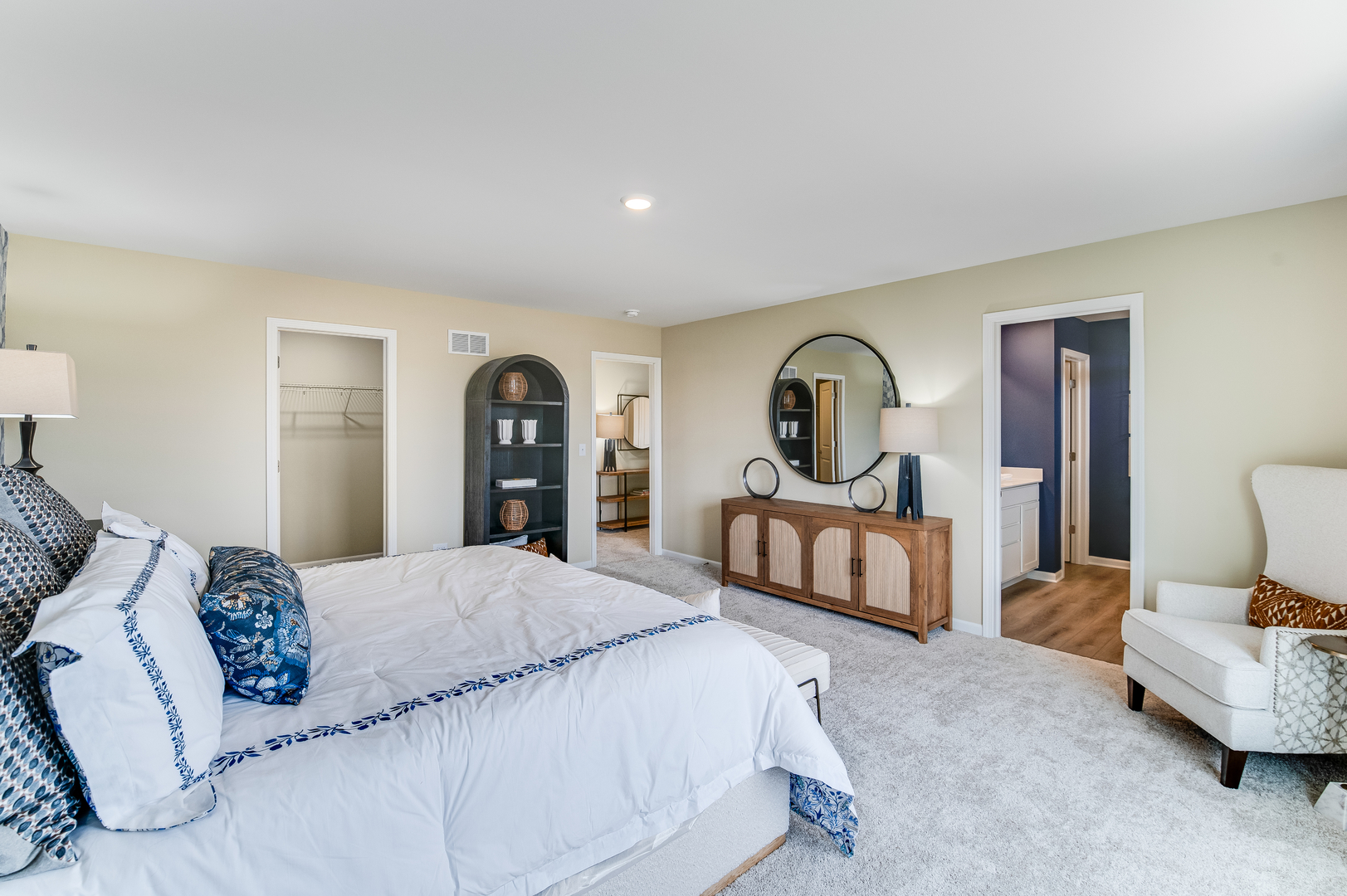 353 Danforth Drive Oswego, IL 60543 - Photo 12 of 22 a bedroom with a bed and a dresser
