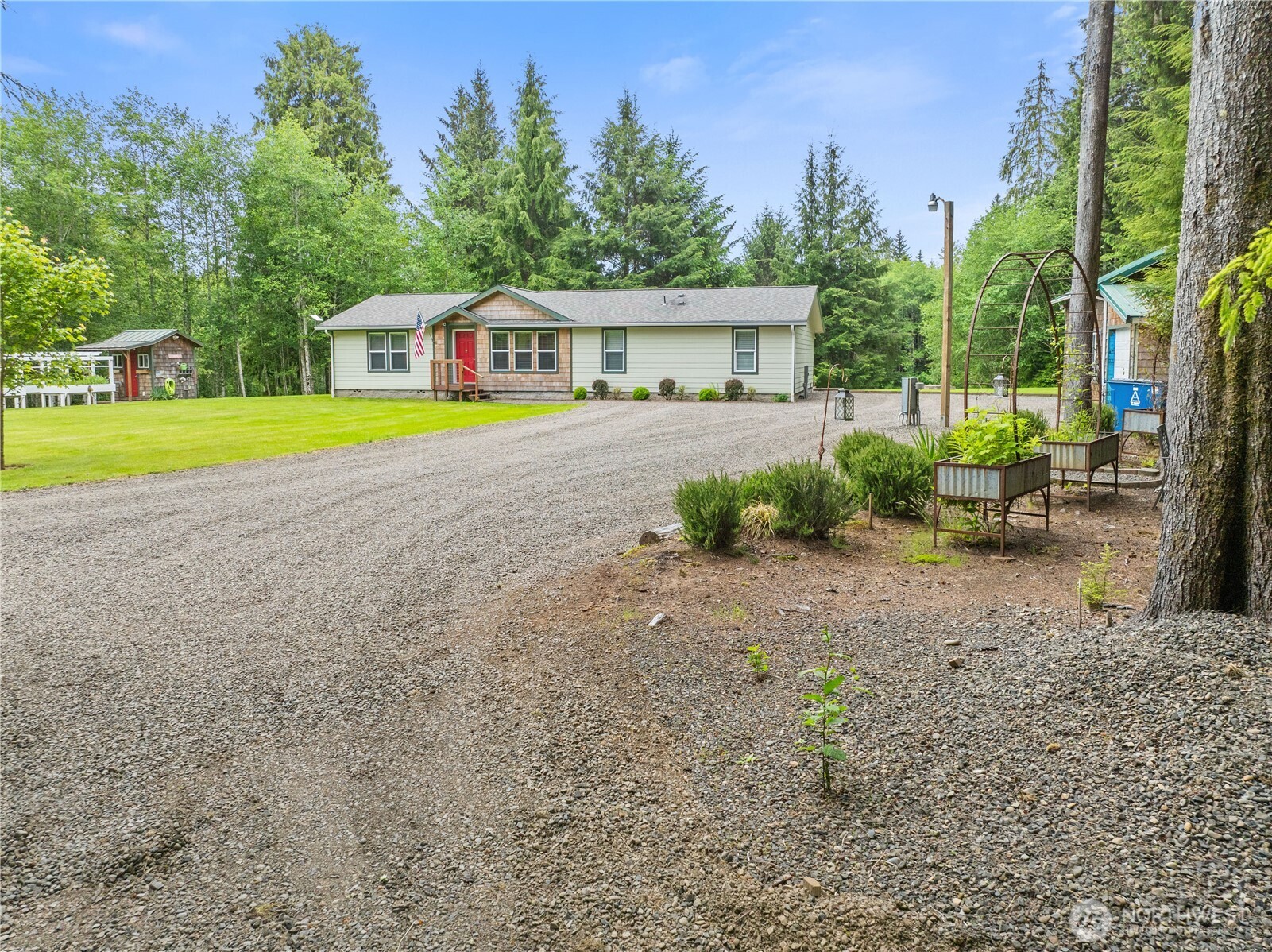 132 River Park Road Forks, WA 98331 - Photo 6 of 40 a view of a house with a yard