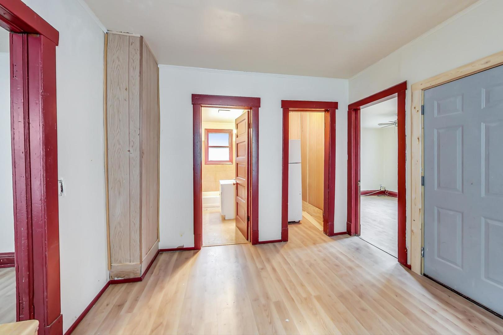 3441 Chicago Road Steger, IL 60475 - Photo 14 of 31 a view of a room with wooden floor and closet