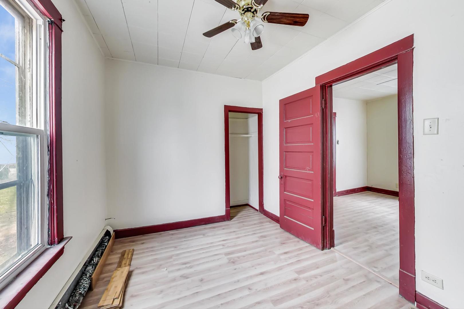 3441 Chicago Road Steger, IL 60475 - Photo 19 of 31 a view of a room with wooden floor and window