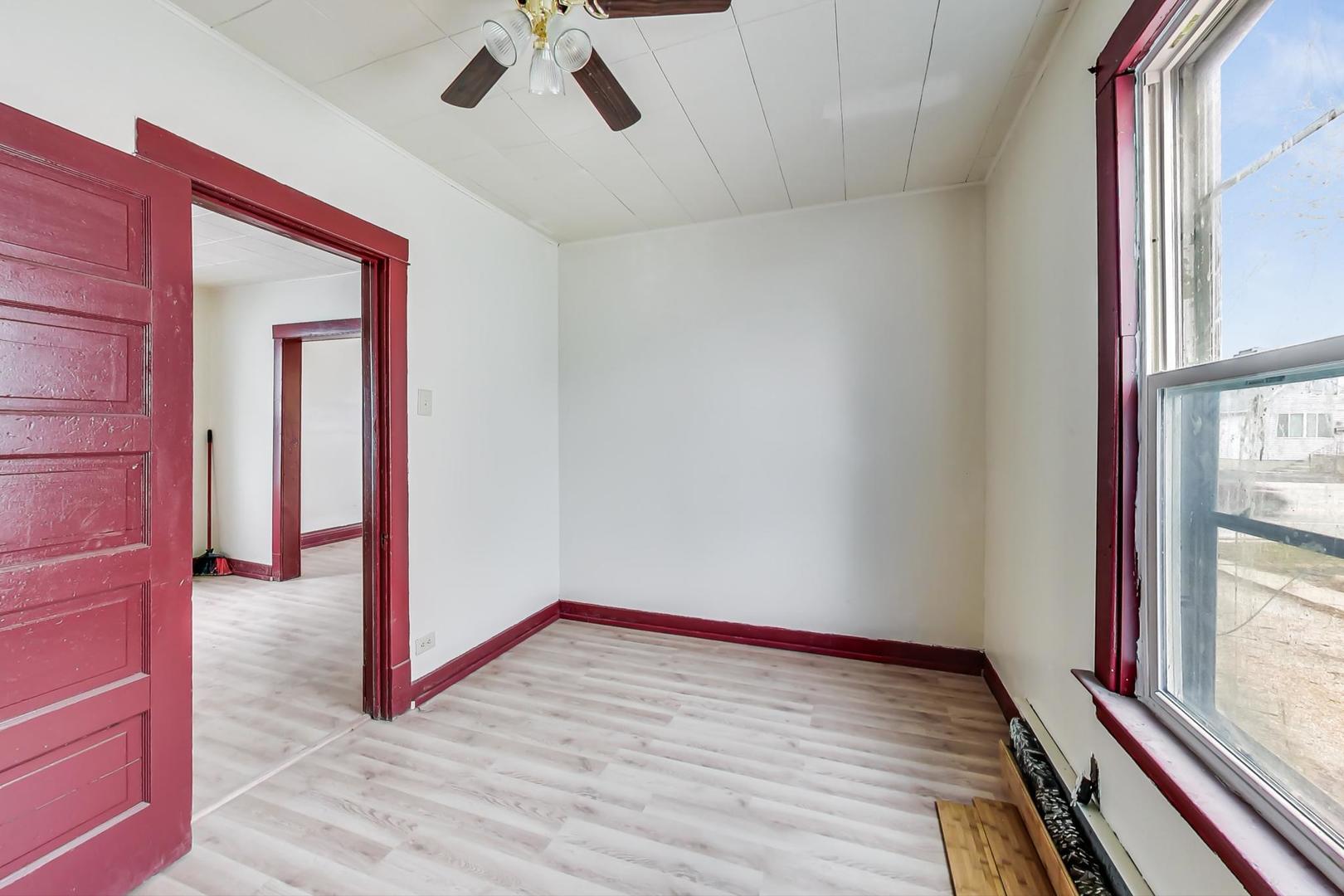 3441 Chicago Road Steger, IL 60475 - Photo 20 of 31 a view of an empty room with a window