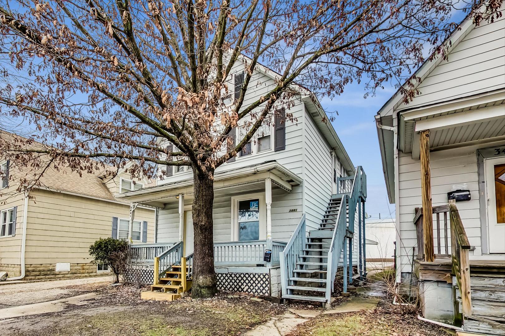 3441 Chicago Road Steger, IL 60475 - Photo 2 of 31 a view of a house with brick walls