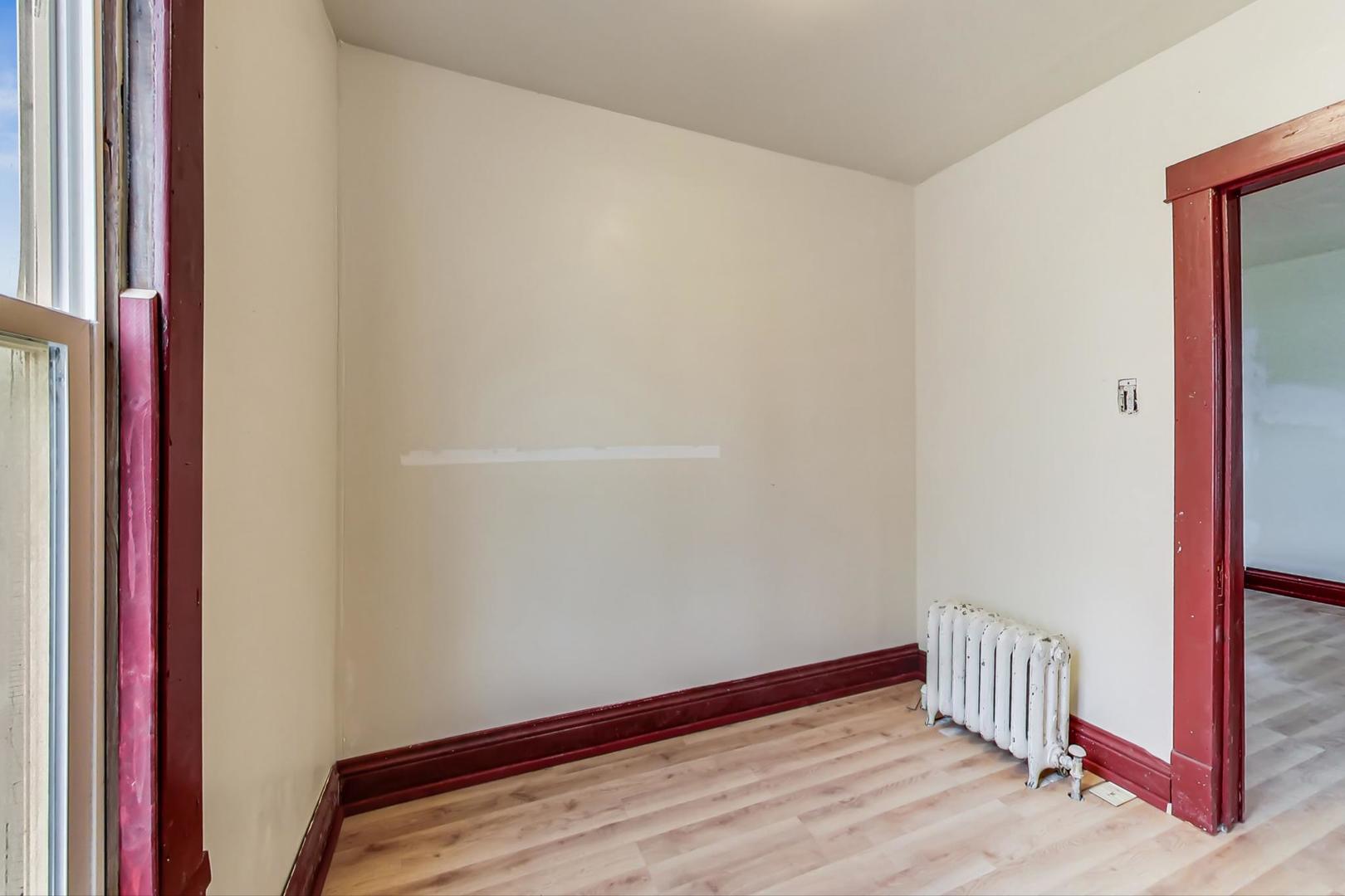 3441 Chicago Road Steger, IL 60475 - Photo 22 of 31 a view of hallway with wooden floor
