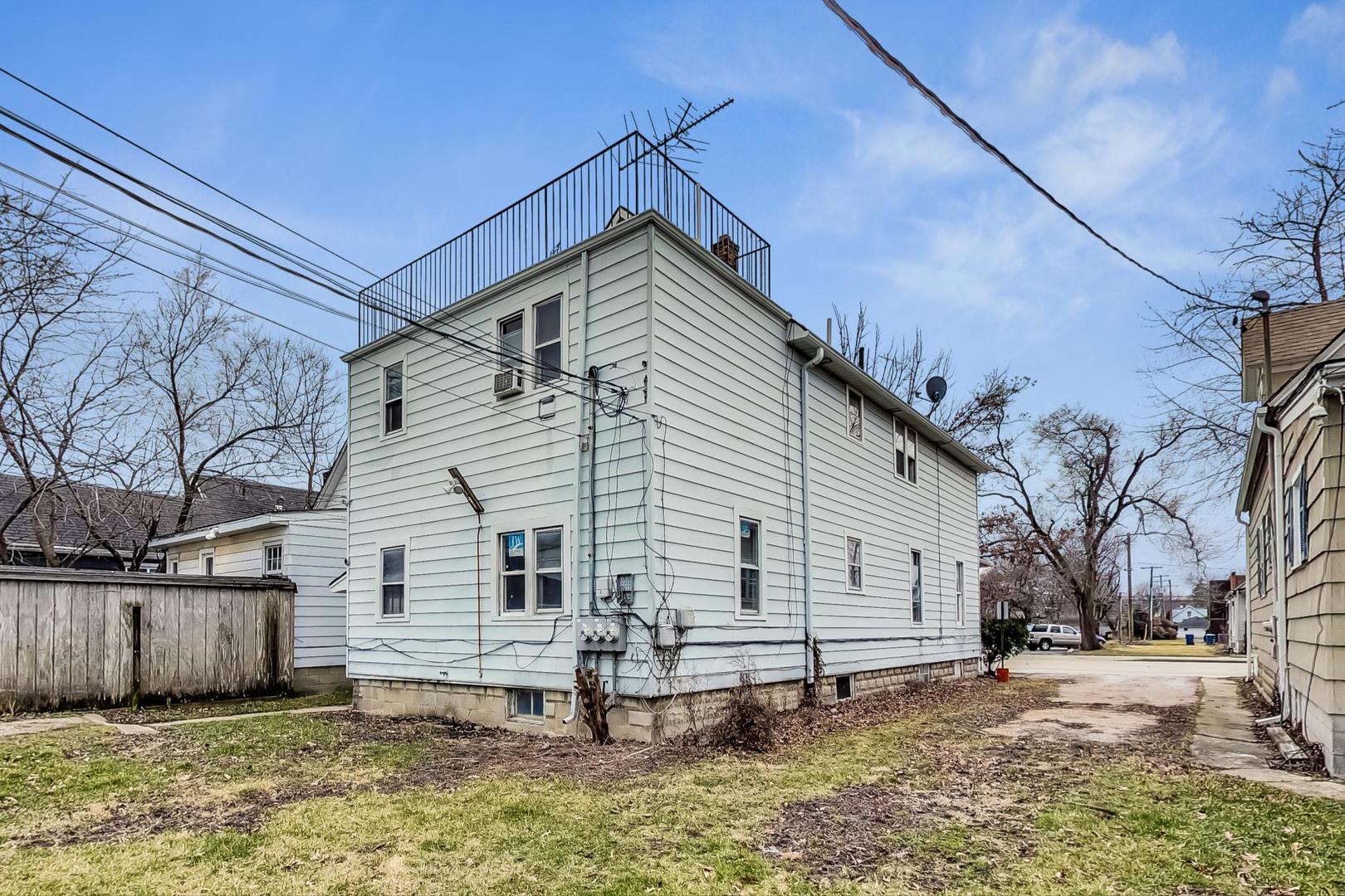 3441 Chicago Road Steger, IL 60475 - Photo 26 of 31 a view of a house with a yard