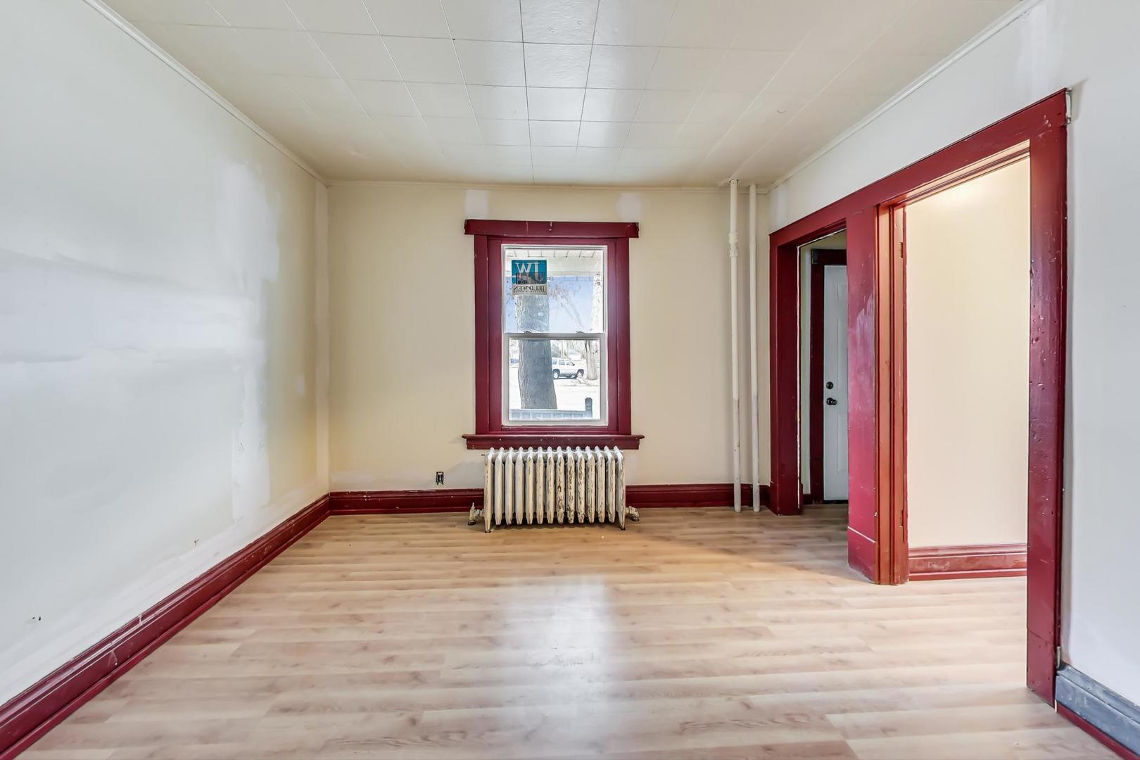 3441 Chicago Road Steger, IL 60475 - Photo 6 of 31 an empty room with windows