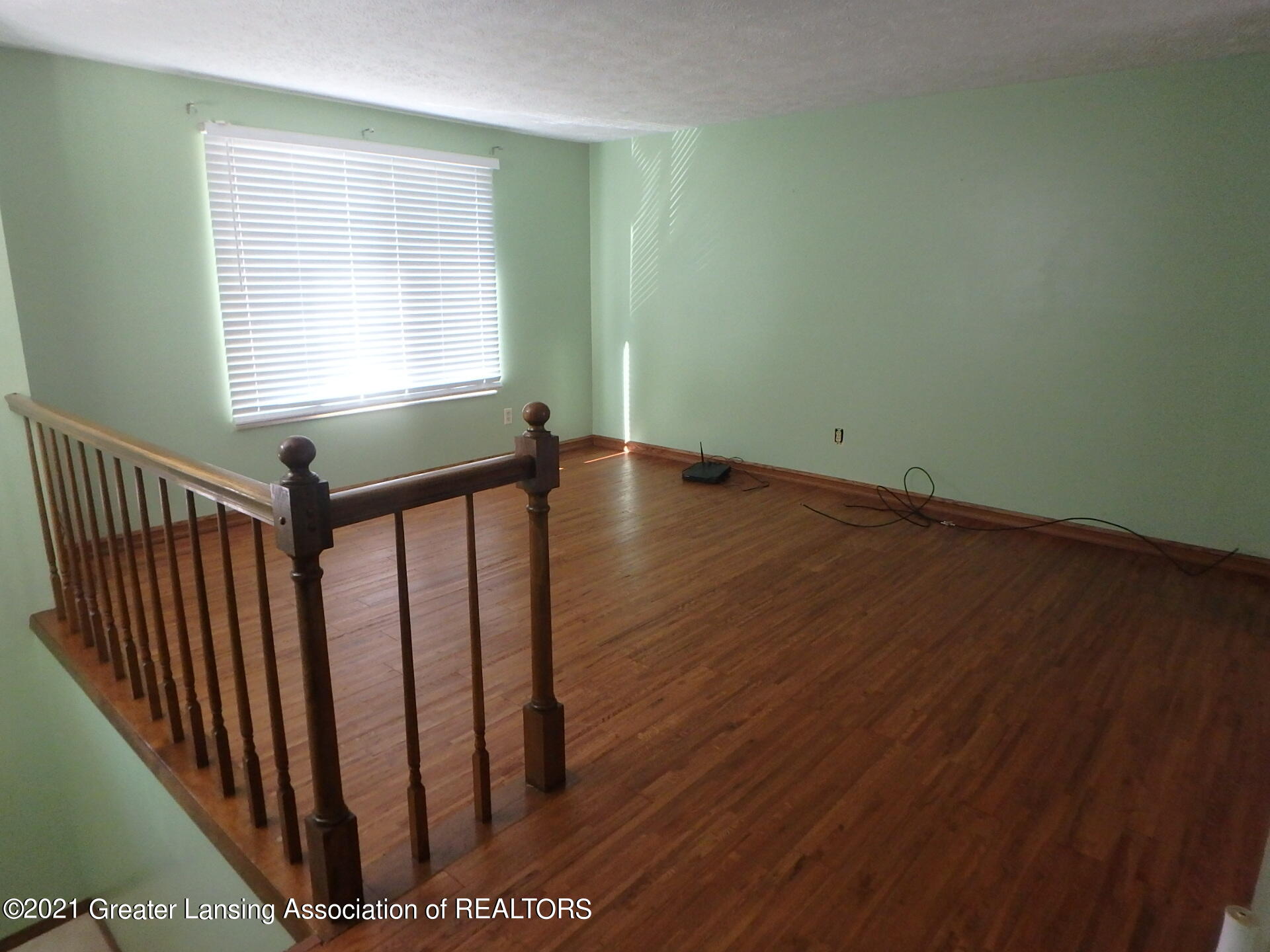 5905 Rockingham Drive Lansing, MI 48911 - Photo 9 of 30 living room empty