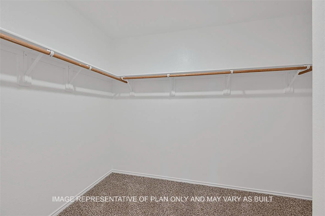 5417-bear Run 5417-bear Run Bryan, TX 77807 - Photo 9 of 18 a view of small space with racks on the wall