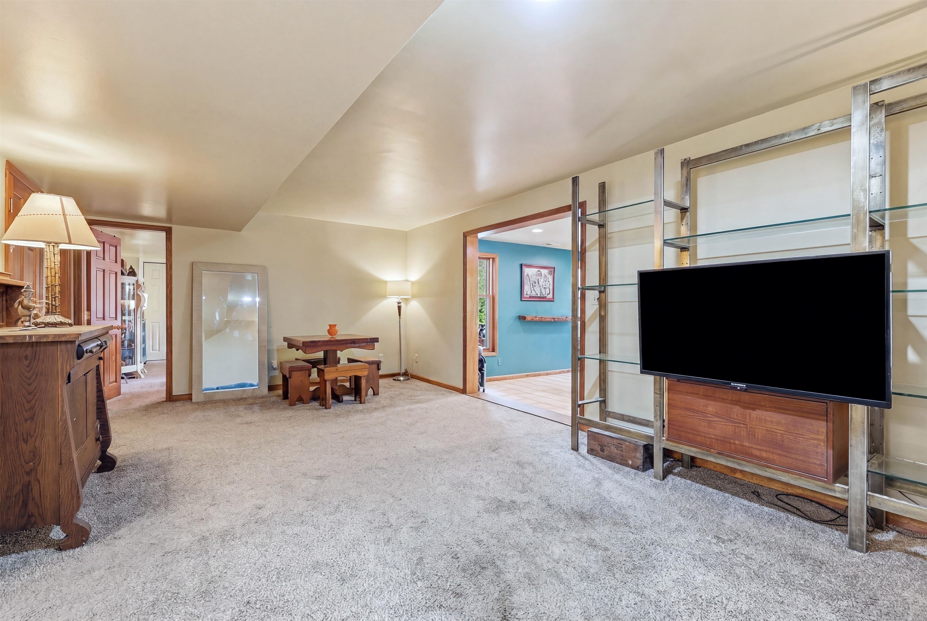 13 Signal Point Lane Galena, IL 61036 - Photo 40 of 47 a view of game room with window and couch