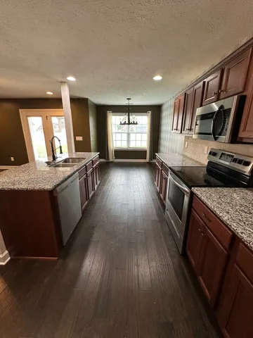 a bathroom with a bathtub and shower