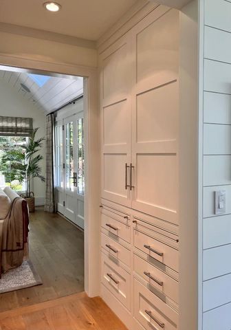 a view of bedroom with furniture and large window