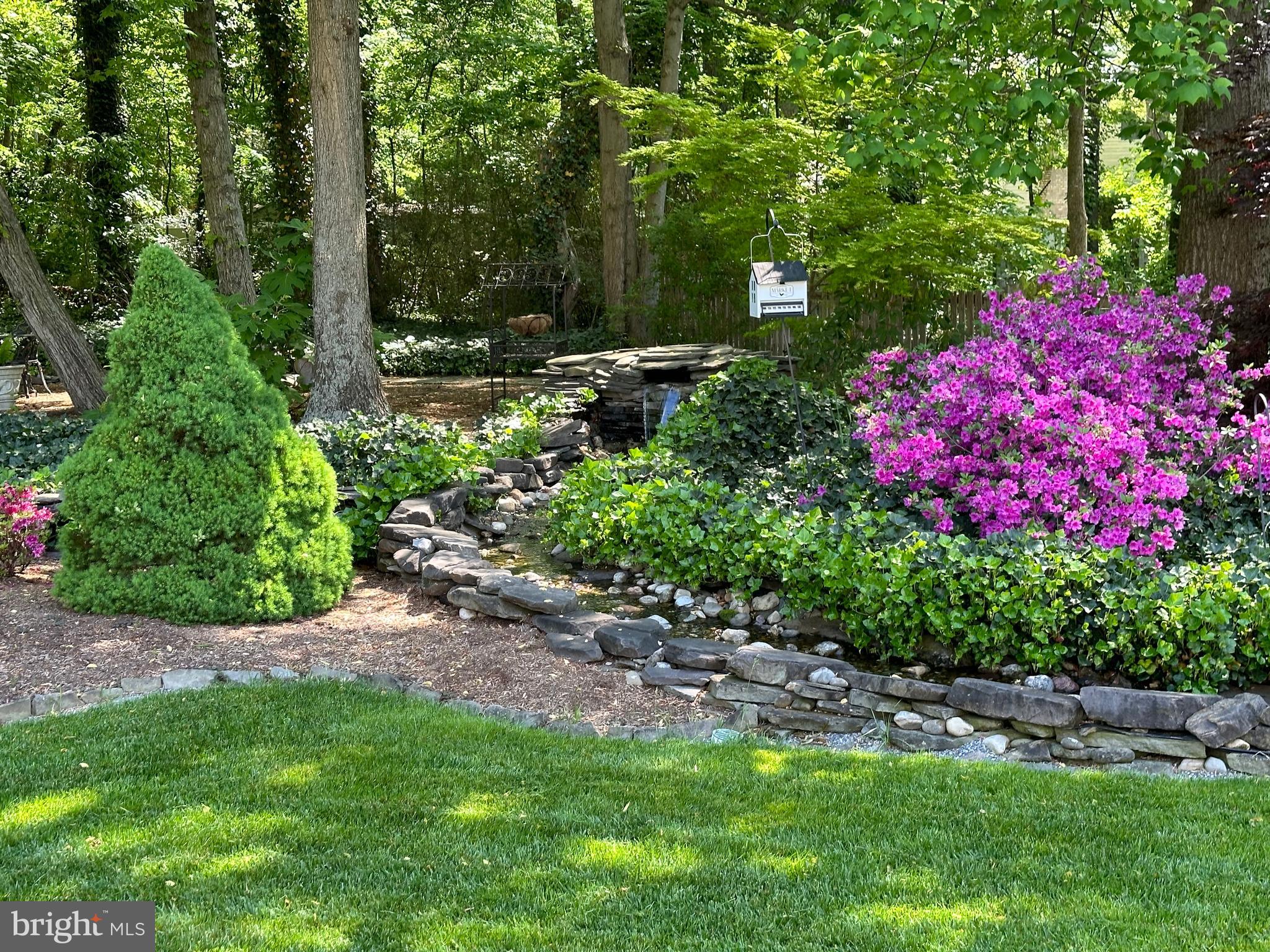 161 Burning Tree Road Dover, DE 19904 - Photo 42 of 53 Walk through the pathway through the garden area