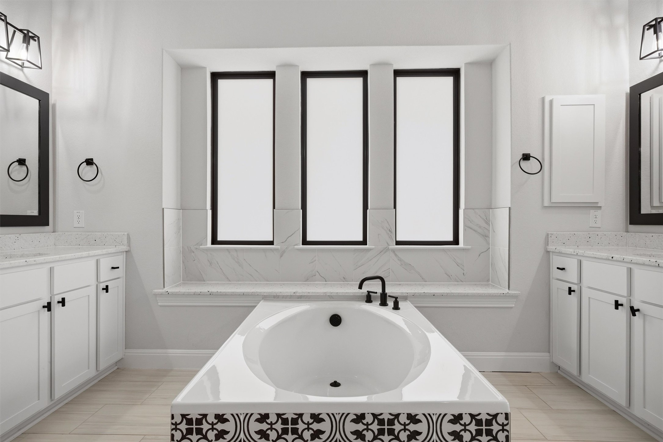 208 Tovas Secret Cove Georgetown, TX 78628 - Photo 18 of 40 a bathroom with a sink a vanity and a mirror