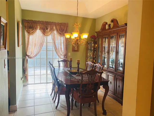 a living room with a couch and a table