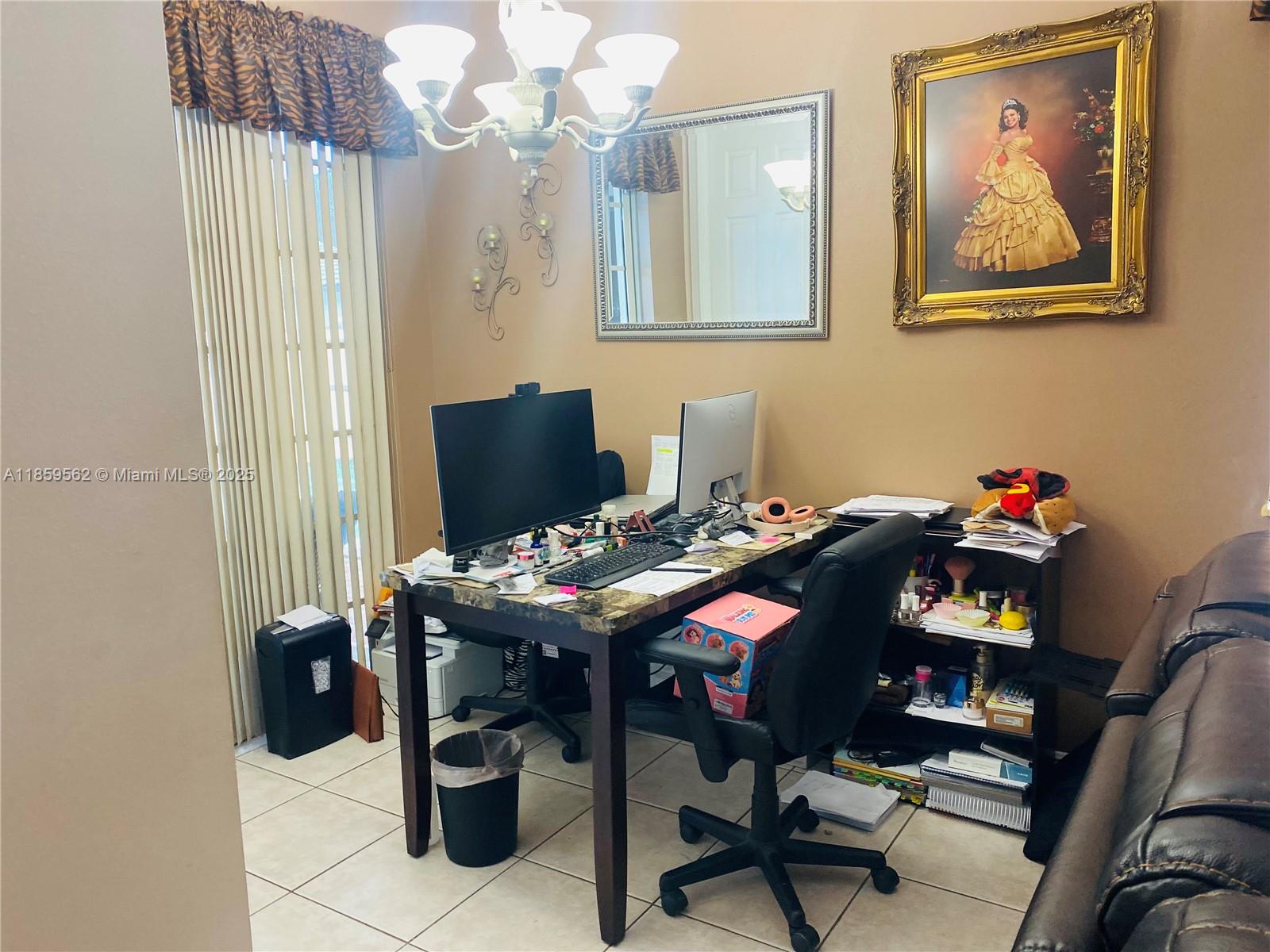 7760 Northwest 163rd Street Miami Lakes, FL 33016 - Photo 18 of 68 a view of a workspace with furniture