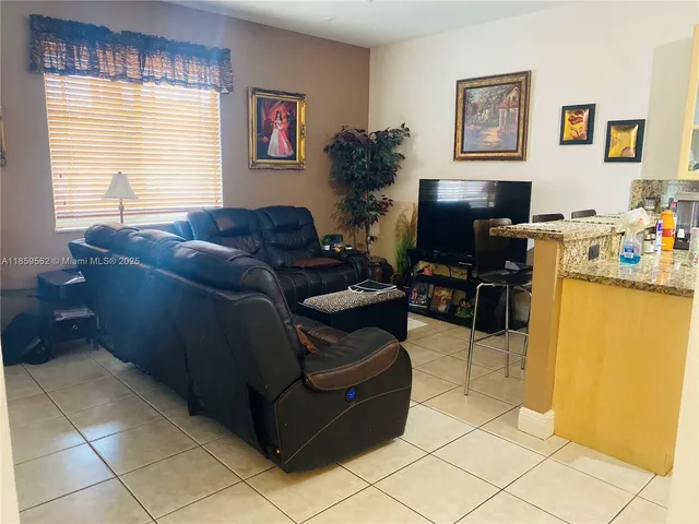 a bathroom with a tub and shower