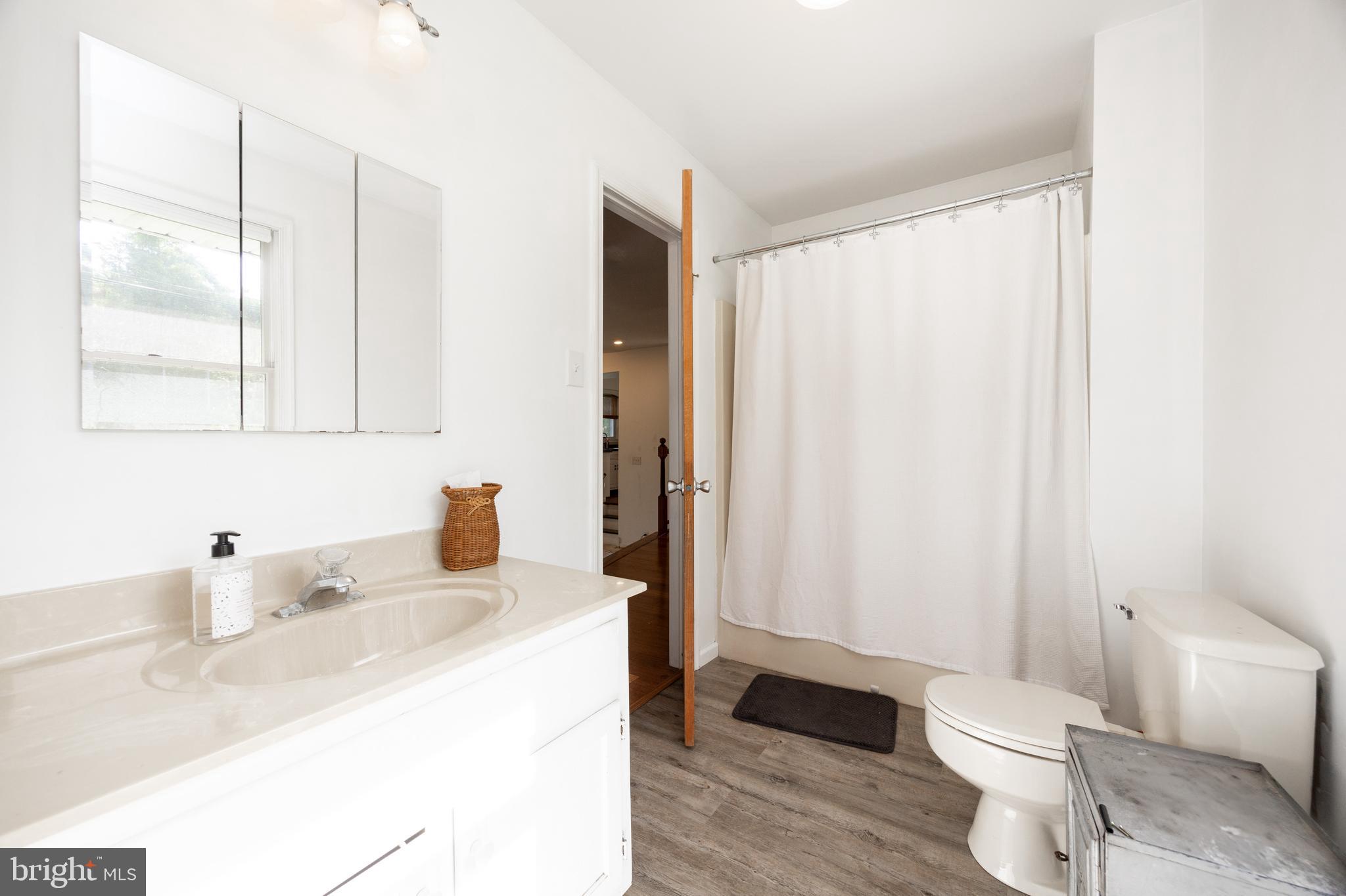 5509 Hoppenville Road Green Lane, PA 18054 - Photo 14 of 70 a bathroom with a sink toilet and shower